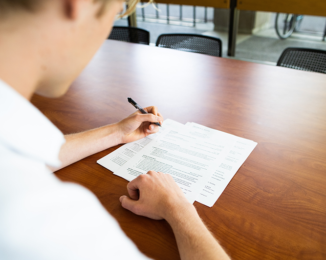 student reviewing resume