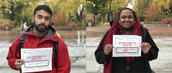 Two students hold up signs; one reads: "My reason to stay is: You're worth it". Another reads: "My reason to stay is: Because there's no one like me".
