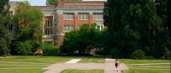 person walking in MU quad