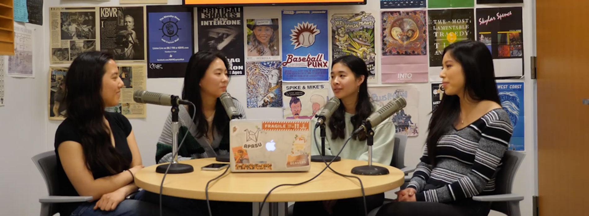 Four students recording the Making Waves podcast